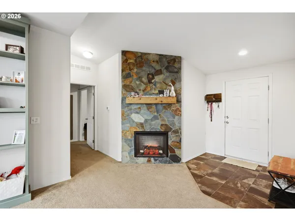 a living room with furniture and a couch
