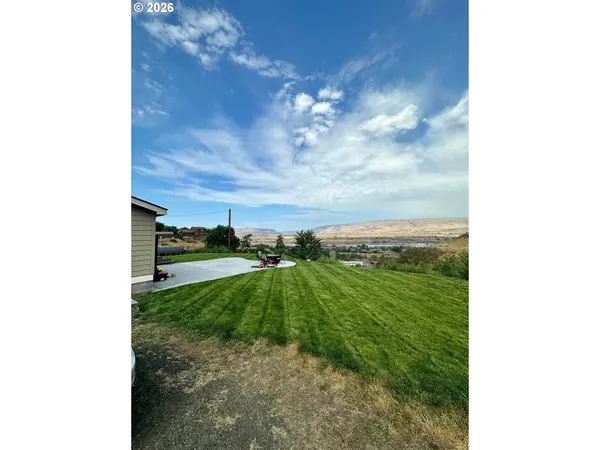 a view of a balcony with an ocean view