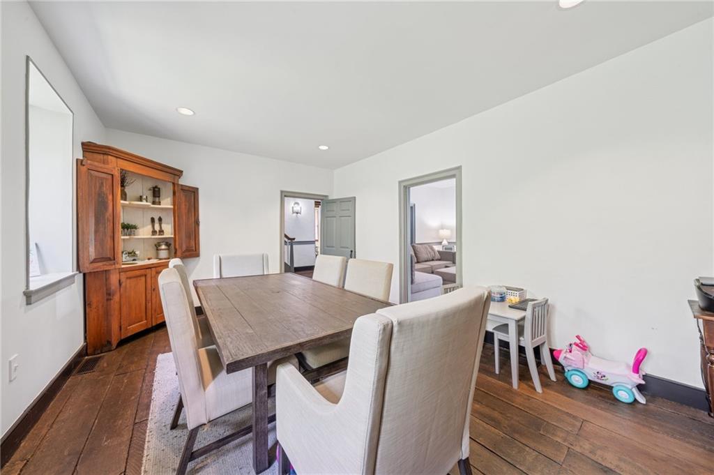 107 Hatfield Street Jefferson, PA 15344 - Photo 11 of 35 a view of a dining room with furniture window and wooden floor