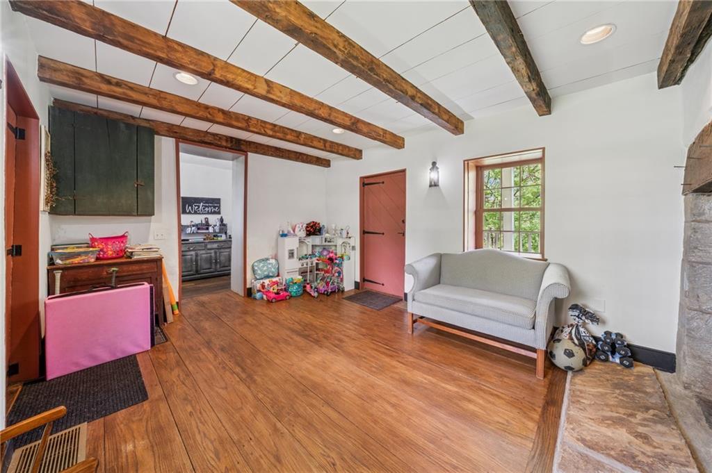 107 Hatfield Street Jefferson, PA 15344 - Photo 16 of 35 a living room with furniture and a flat screen tv