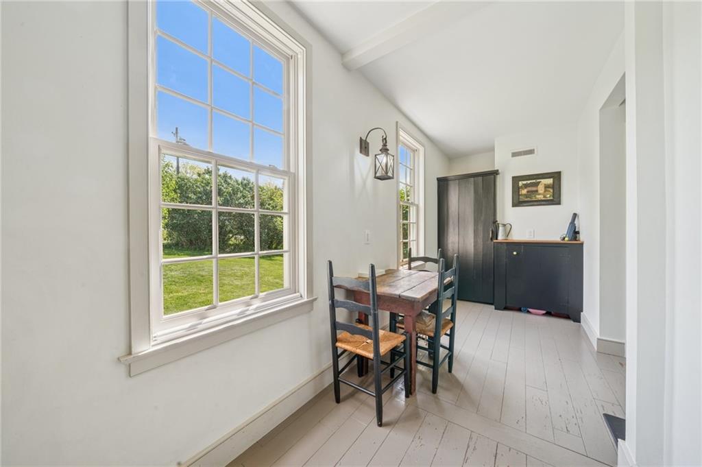 107 Hatfield Street Jefferson, PA 15344 - Photo 17 of 35 a view of a dining room with furniture and a window