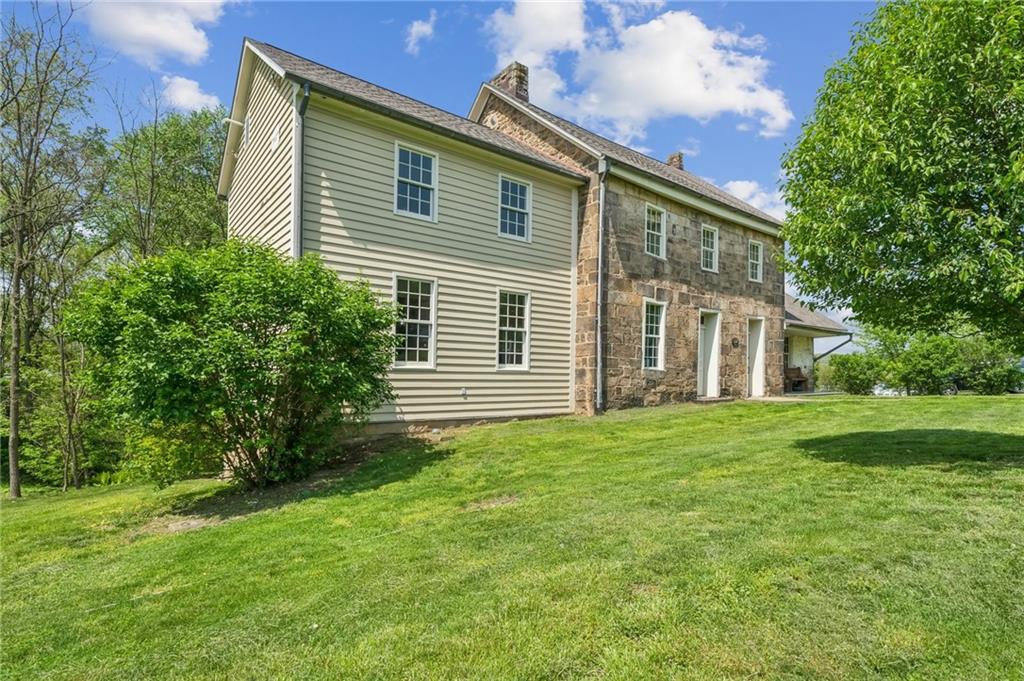 107 Hatfield Street Jefferson, PA 15344 - Photo 3 of 35 a view of a house with backyard and garden