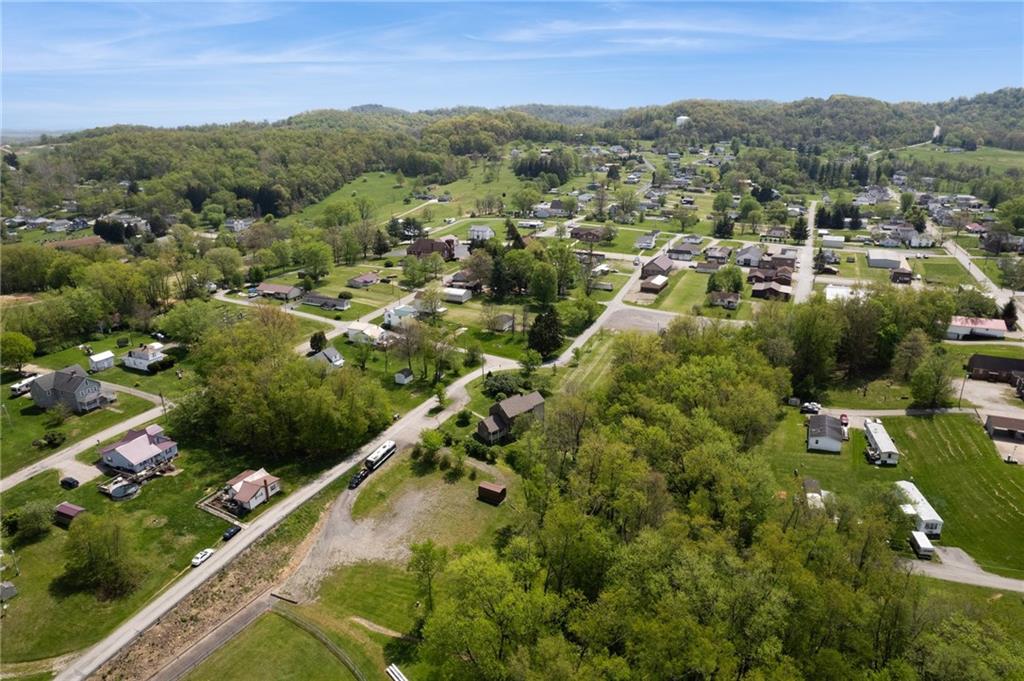 107 Hatfield Street Jefferson, PA 15344 - Photo 35 of 35 an aerial view of residential houses with outdoor space and trees