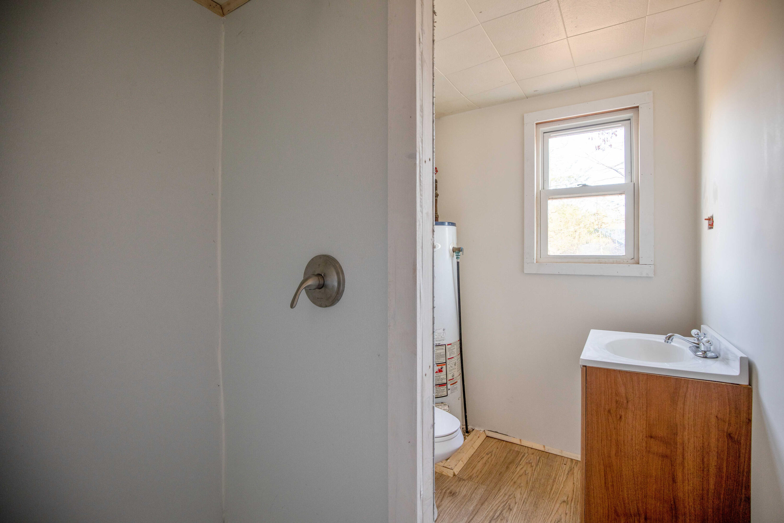 731 Branch Road Wells, ME 04090 - Photo 11 of 32 New shower, toilet and vanity