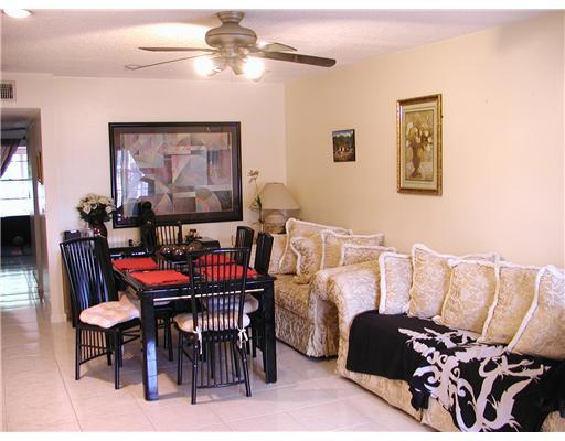 5852 South Rue Road West Palm Beach, FL 33415 - Photo 2 of 7 a view of a livingroom and dining room