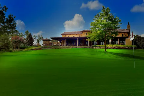 a view of a building with a big yard