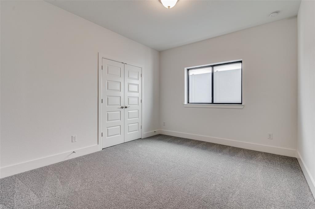 722 Resort Drive Rowlett, TX 75088 - Photo 18 of 24 an empty room with windows