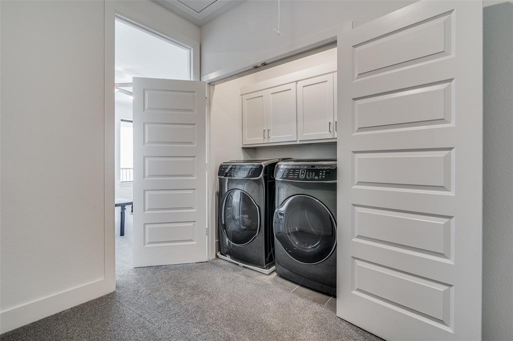 722 Resort Drive Rowlett, TX 75088 - Photo 20 of 24 a view of a storage & utility room with washer and dryer
