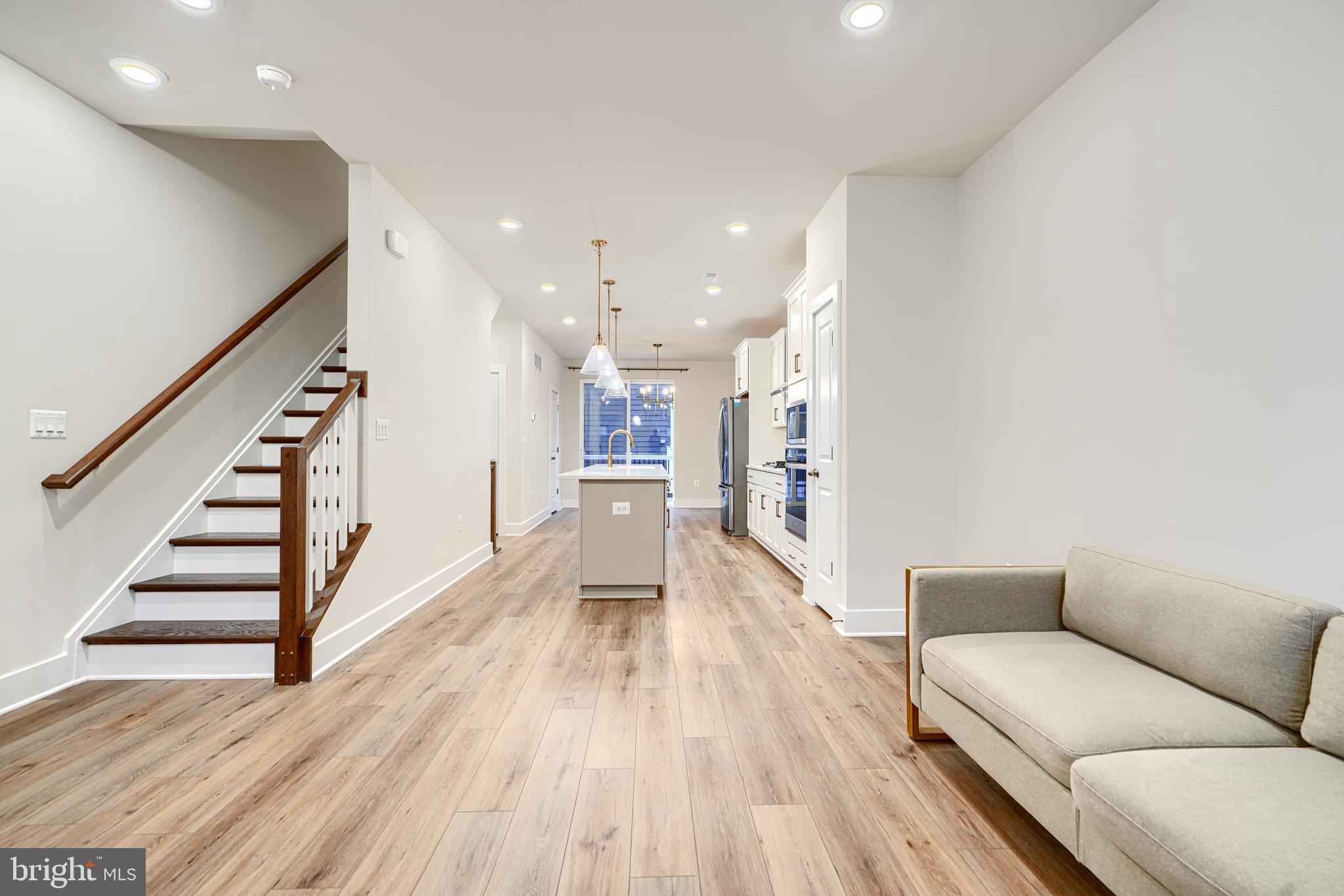 2603 Light Street Baltimore, MD 21230 - Photo 12 of 29 a living room with furniture and a wooden floor