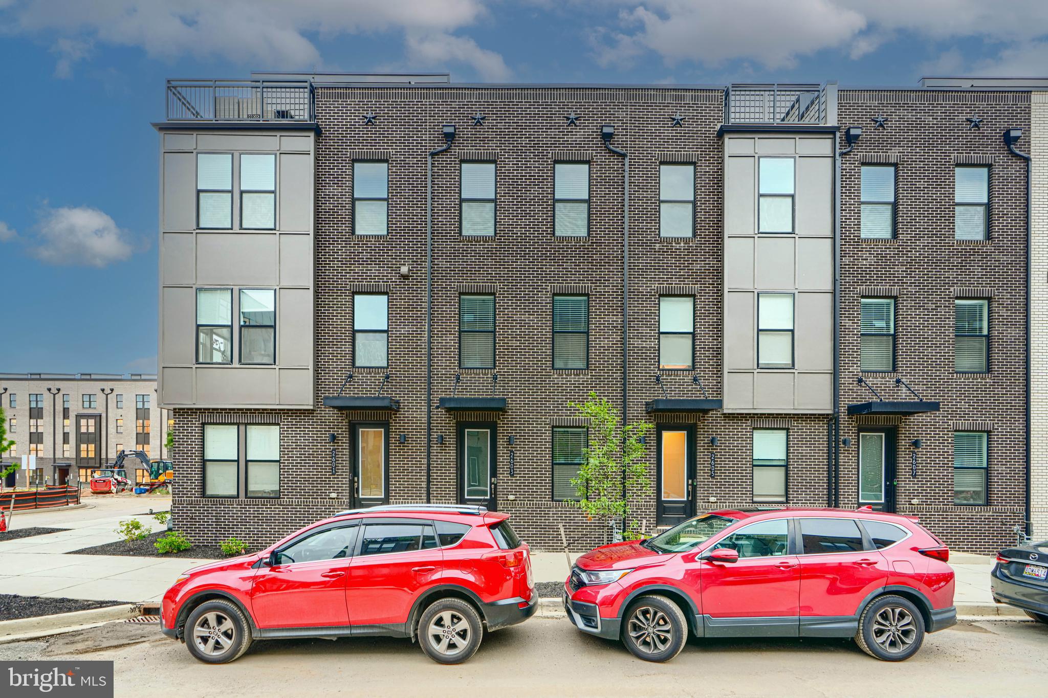 2603 Light Street Baltimore, MD 21230 - Photo 2 of 29 a car parked in front of a big house