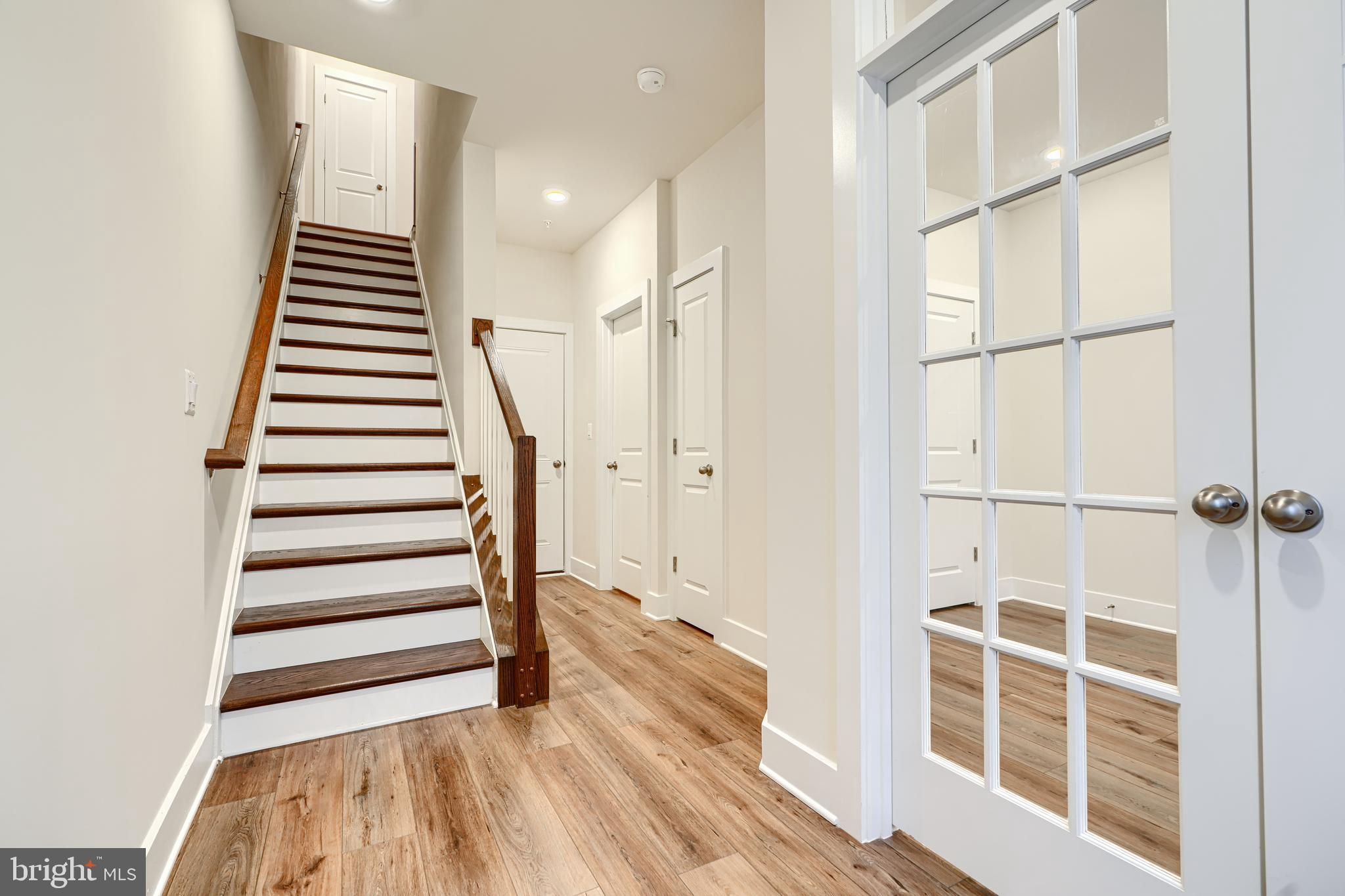 2603 Light Street Baltimore, MD 21230 - Photo 4 of 29 a view of a hallway with stairs and a window