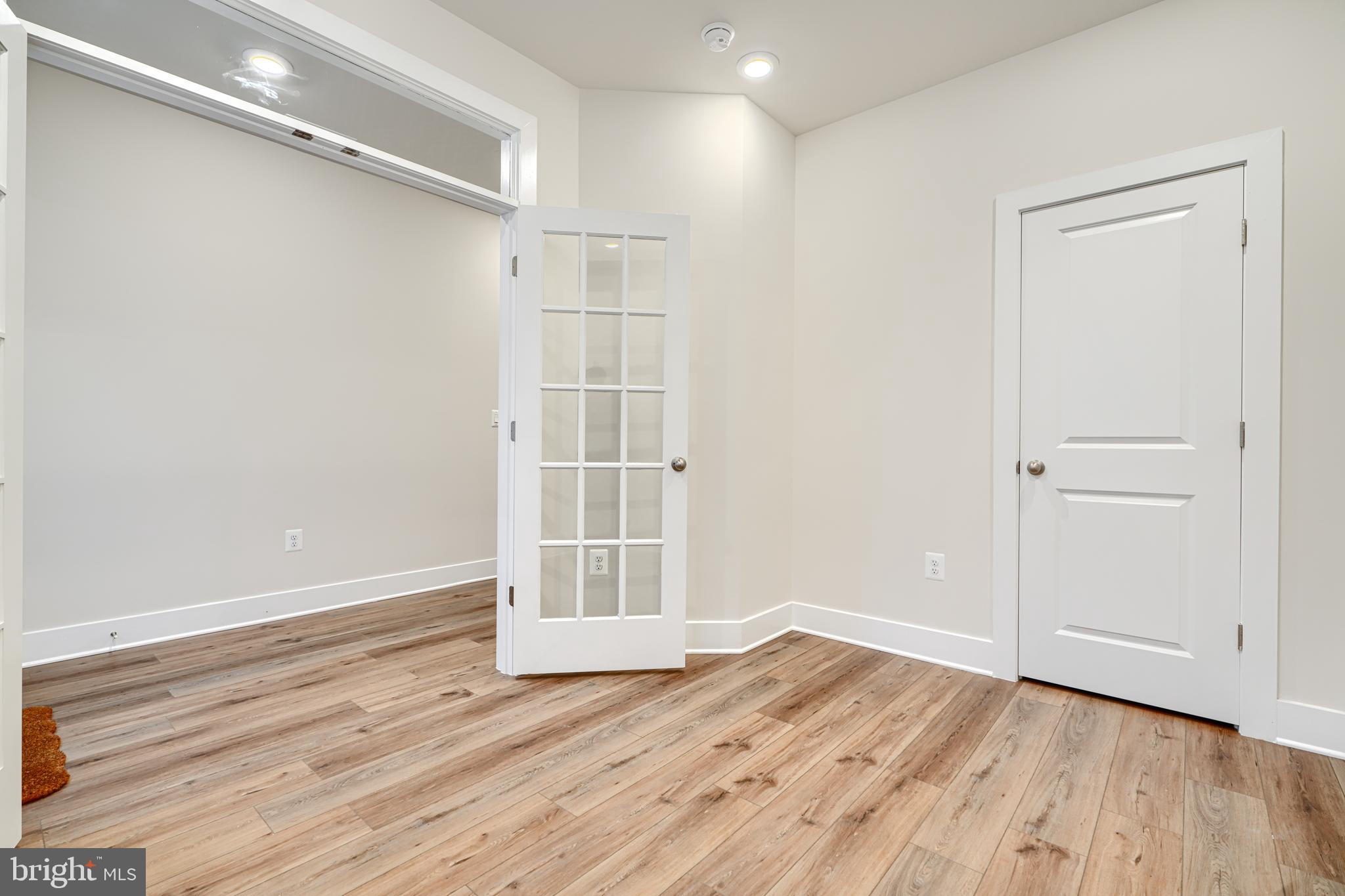 2603 Light Street Baltimore, MD 21230 - Photo 6 of 29 a view of empty room with wooden floor