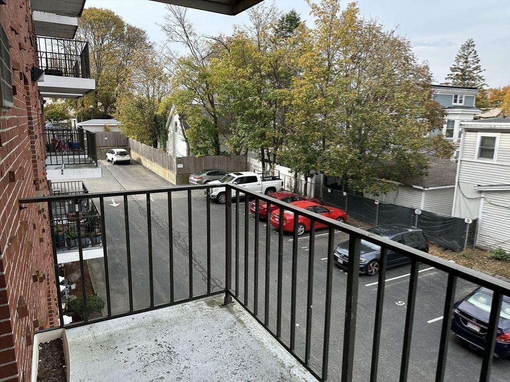 95 Nahant Street, Unit 12 Lynn, MA 01902 - Photo 25 of 28 a view of a balcony with a pot