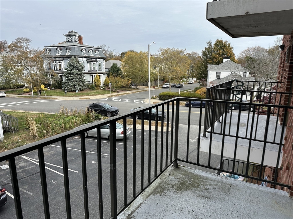 95 Nahant Street, Unit 12 Lynn, MA 01902 - Photo 26 of 28 a view of a building from a balcony