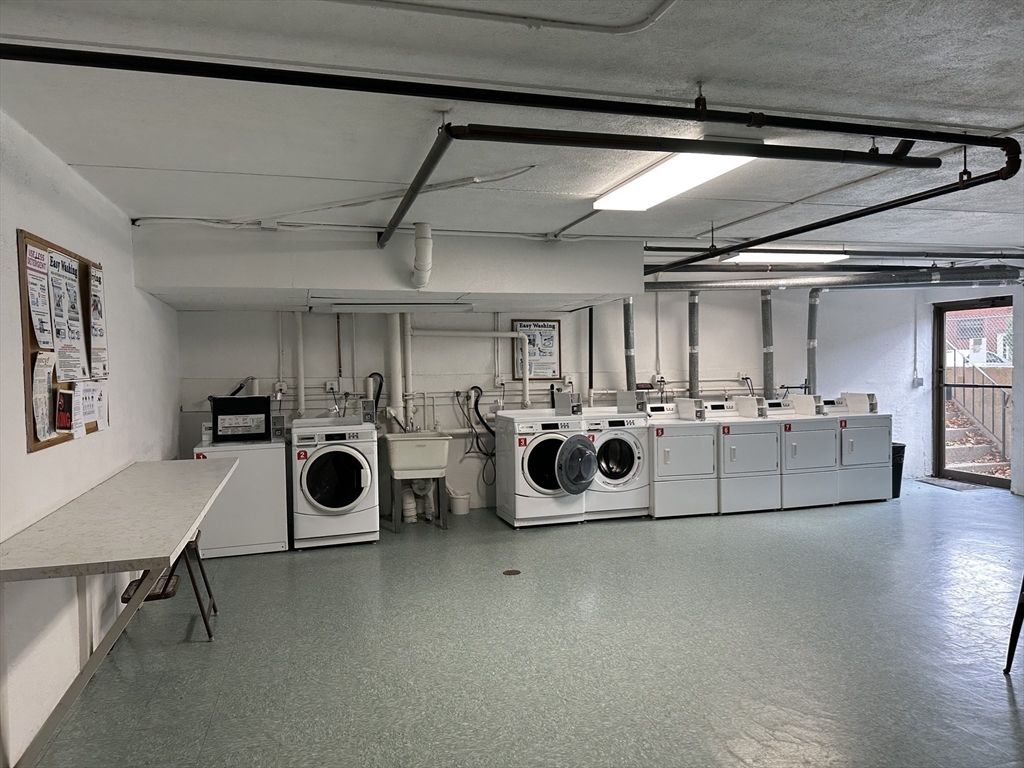 95 Nahant Street, Unit 12 Lynn, MA 01902 - Photo 27 of 28 a utility room with dryer and washer