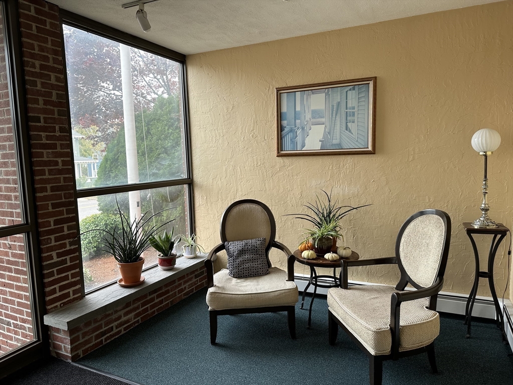 95 Nahant Street, Unit 12 Lynn, MA 01902 - Photo 3 of 28 a living room with furniture and a window