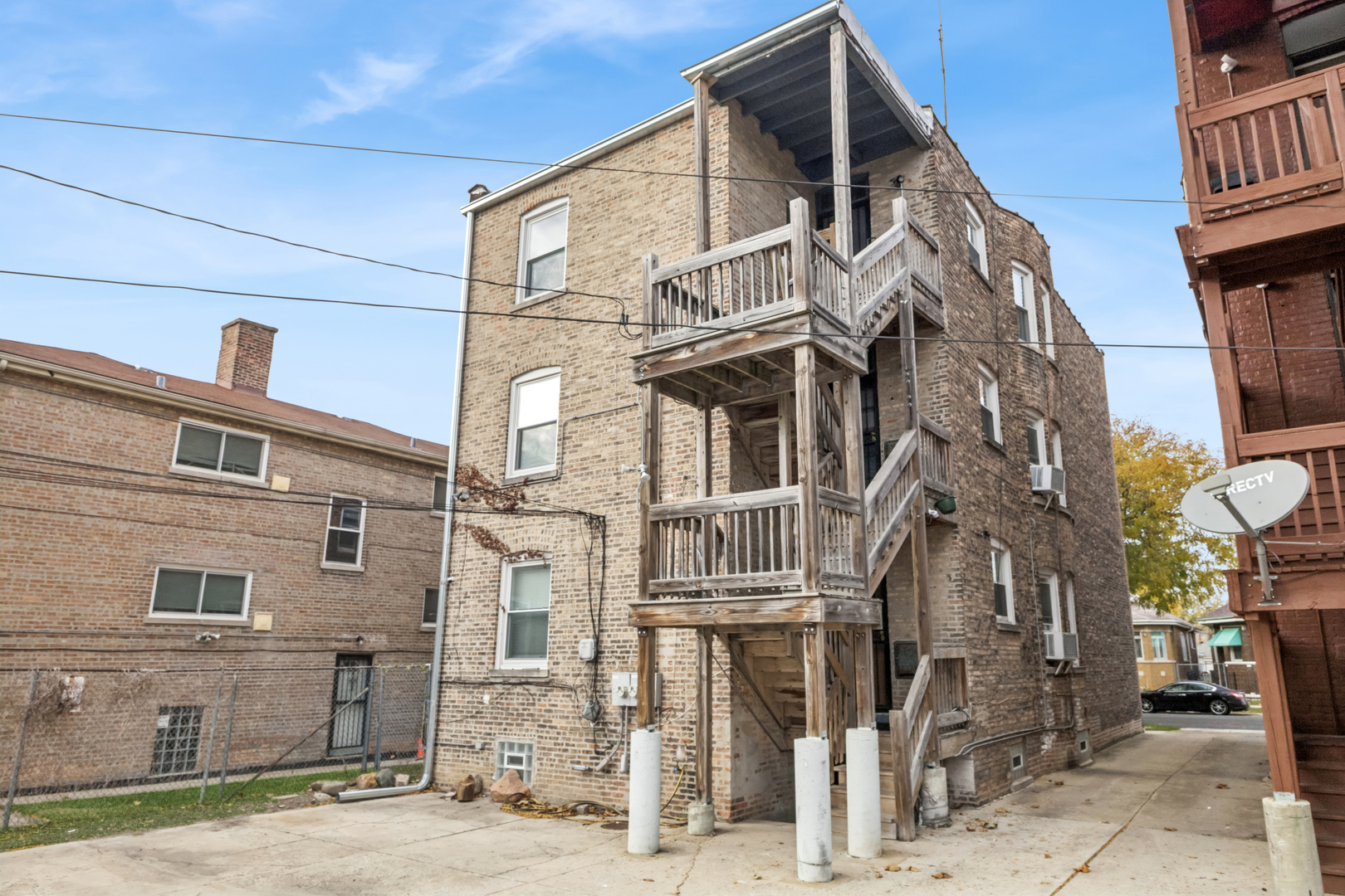 1311 West 91st Street Chicago, IL 60620 - Photo 16 of 19 a view of a building with many windows