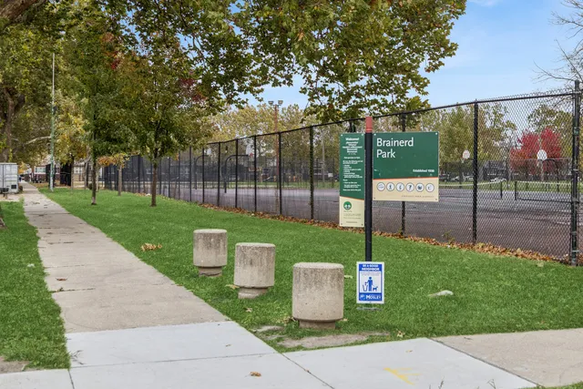 a view of a park with swings