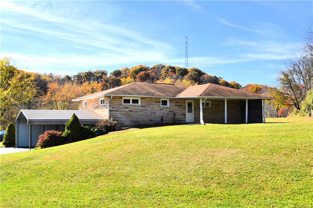 117 Creel Road Kittanning, PA 16201 - Photo 1 of 35 a front view of a house with a yard