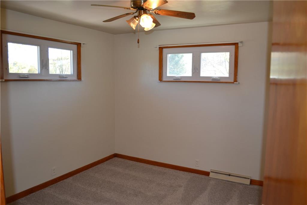 117 Creel Road Kittanning, PA 16201 - Photo 11 of 35 an empty room with windows and fan