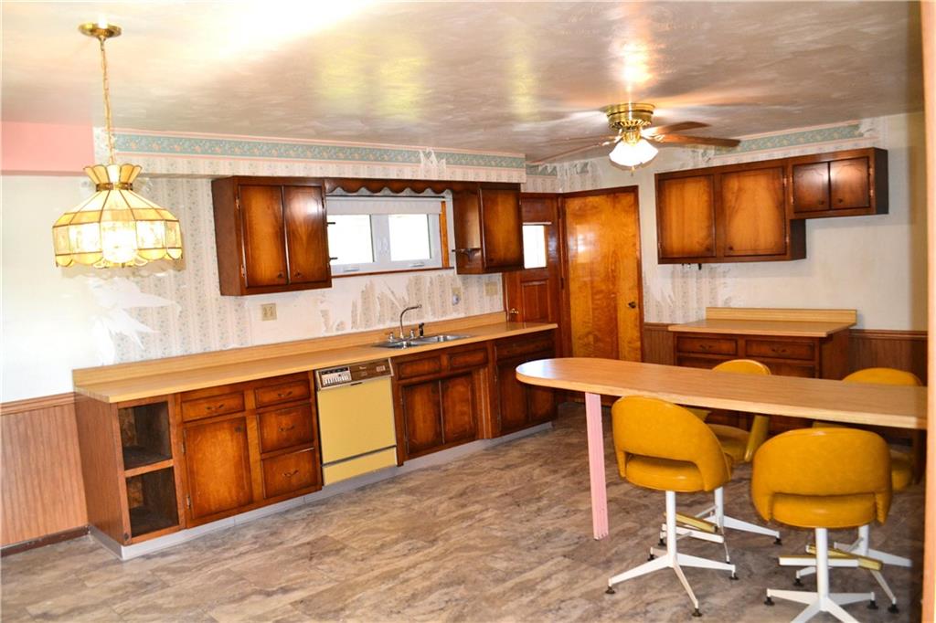 117 Creel Road Kittanning, PA 16201 - Photo 2 of 35 a large kitchen with a table and chairs in it
