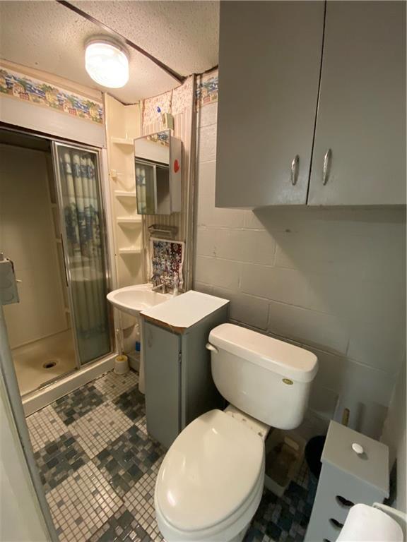 117 Creel Road Kittanning, PA 16201 - Photo 21 of 35 a white toilet sitting next to a bathroom sink
