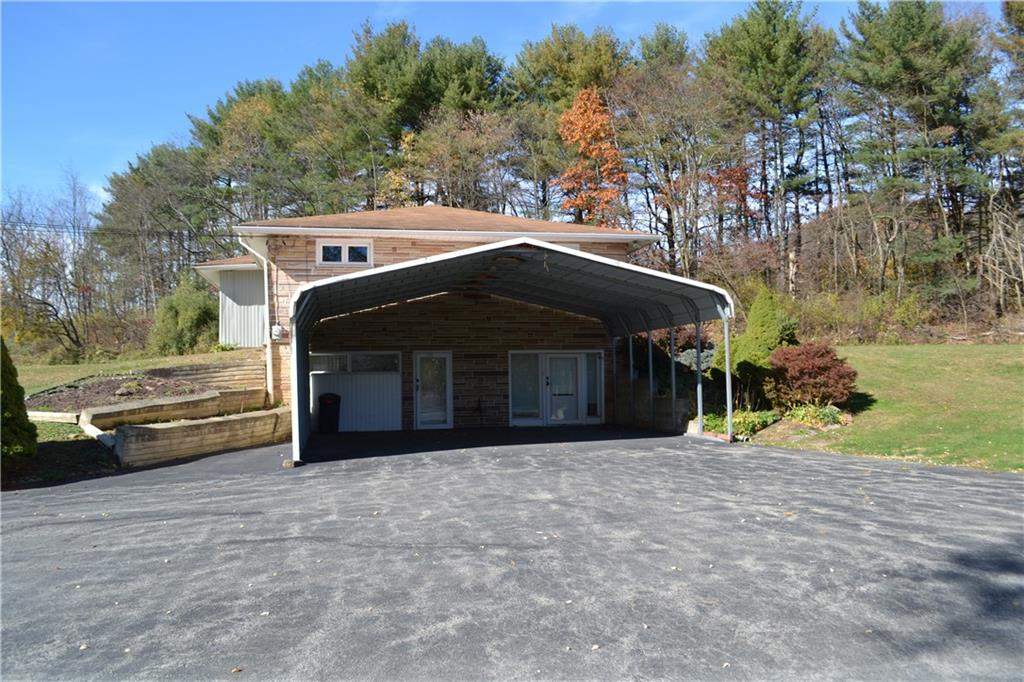 117 Creel Road Kittanning, PA 16201 - Photo 33 of 35 a front view of a house with a garden