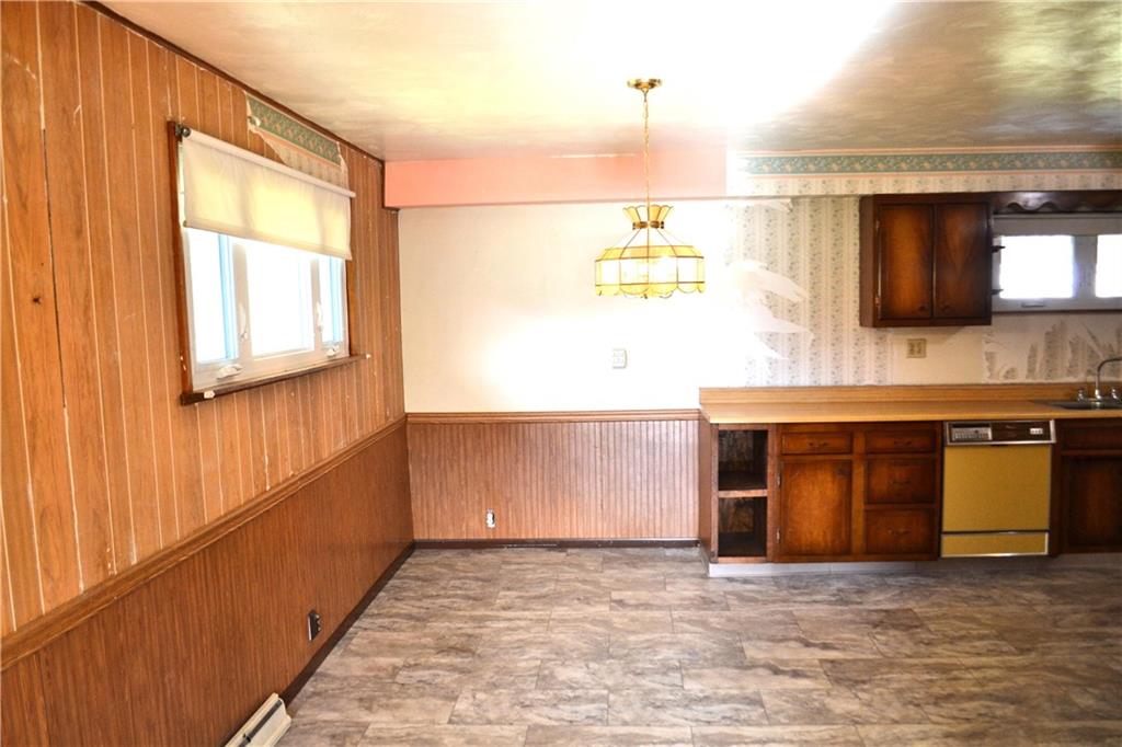 117 Creel Road Kittanning, PA 16201 - Photo 6 of 35 a view of a kitchen with a stove and a window
