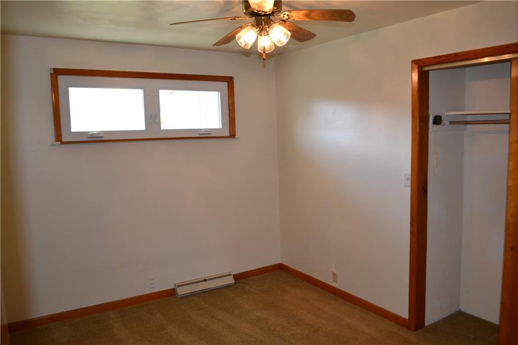 117 Creel Road Kittanning, PA 16201 - Photo 10 of 35 an empty room with a window and a chandelier fan