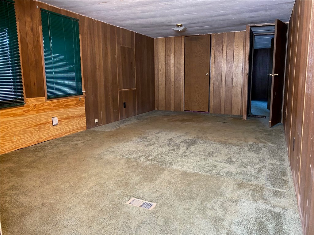 54899 Church Road Callahan, FL 32011 - Photo 12 of 35 a view of an empty room with closet area