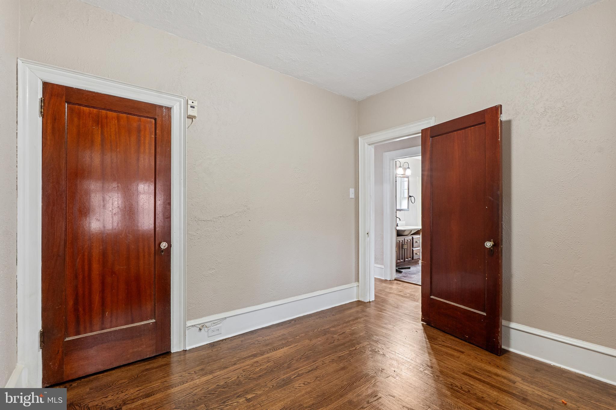 414 Main Street Dorchester, NJ 08316 - Photo 10 of 22 an empty room with wooden floor and closet