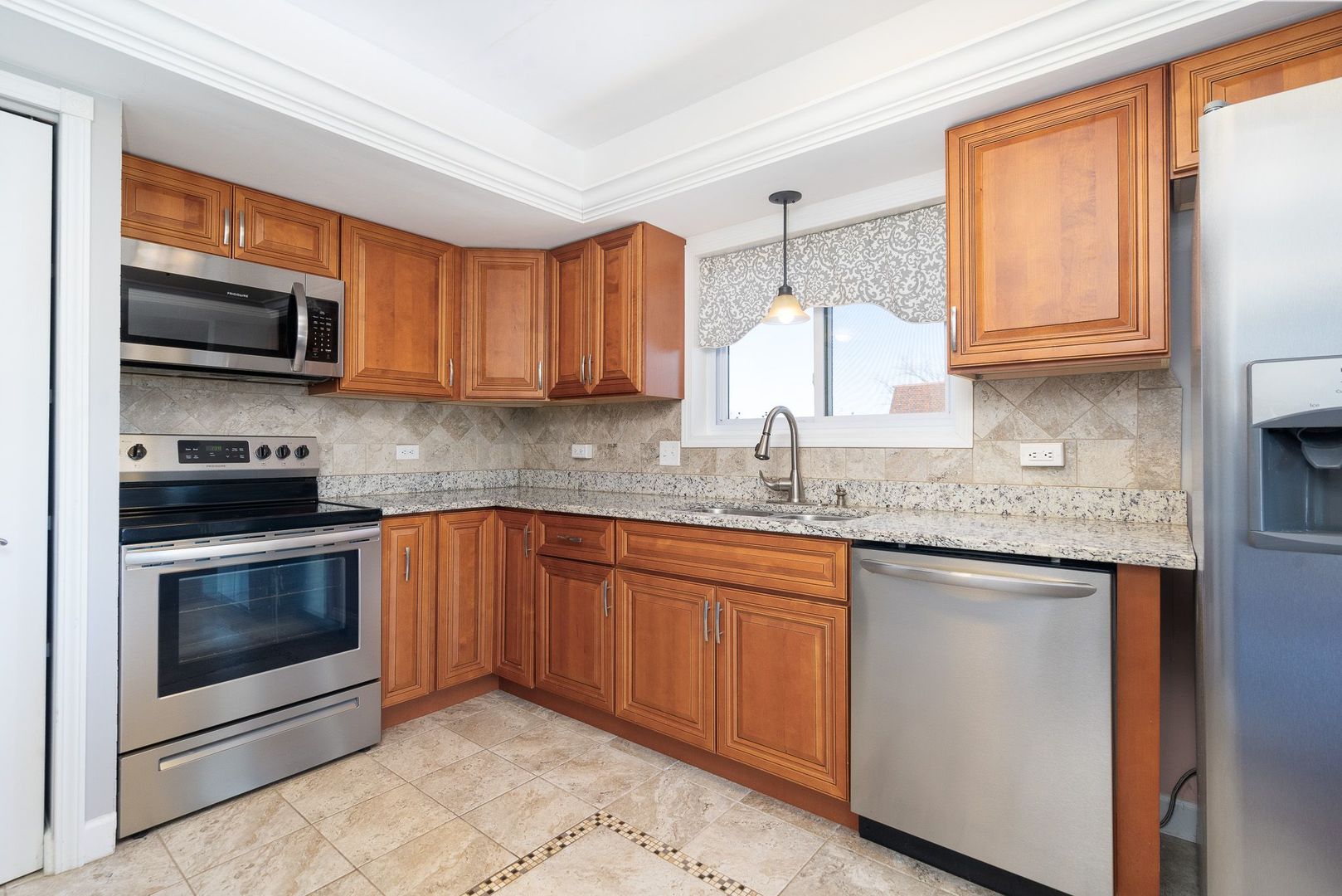 11137 E Road, Unit C Palos Hills, IL 60465 - Photo 11 of 29 a kitchen with stainless steel appliances granite countertop a sink stove and microwave