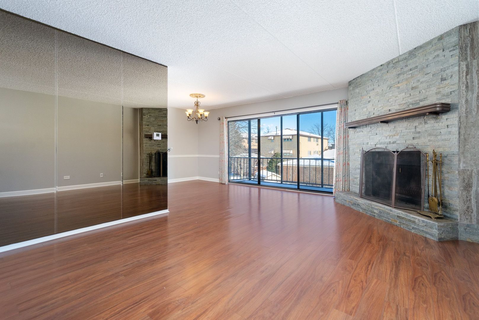 11137 E Road, Unit C Palos Hills, IL 60465 - Photo 16 of 29 wooden floor fireplace and natural light in room