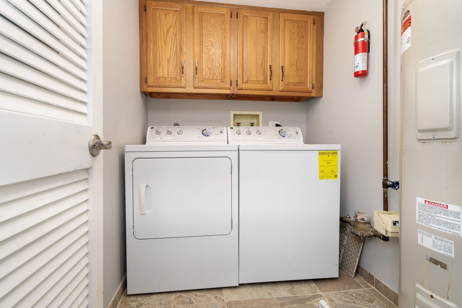 11137 E Road, Unit C Palos Hills, IL 60465 - Photo 19 of 29 a utility room with dryer and washer
