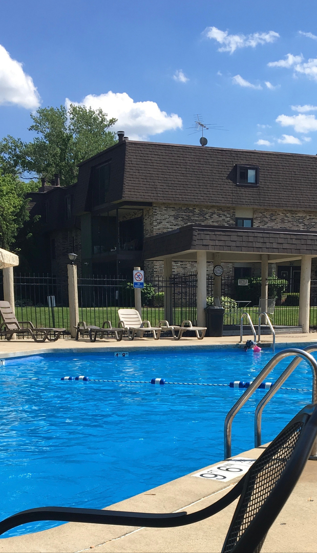 11137 E Road, Unit C Palos Hills, IL 60465 - Photo 29 of 29 a view of a house with pool