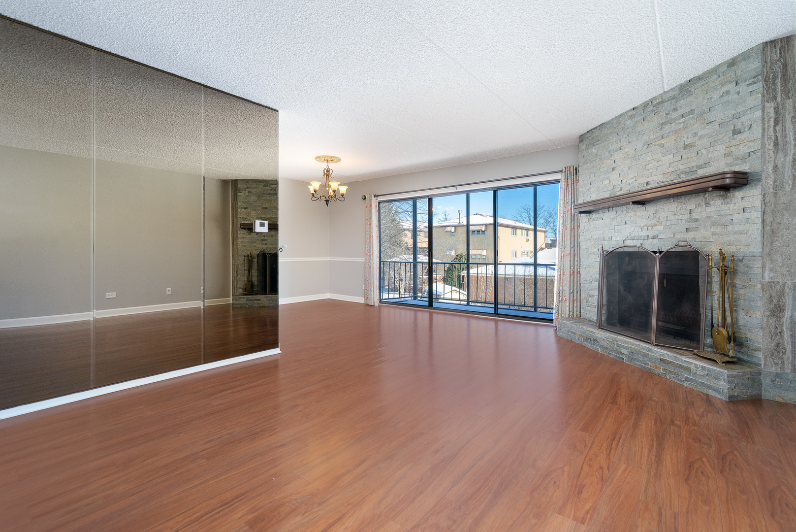 11137 E Road, Unit C Palos Hills, IL 60465 - Photo 7 of 29 wooden floor fireplace and natural light in room