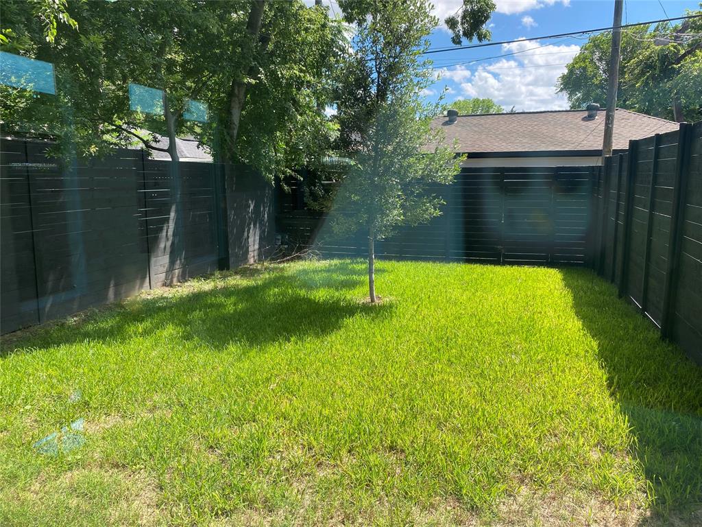 807 South Glasgow Drive Dallas, TX 75223 - Photo 25 of 25 a view of a backyard with a small pool