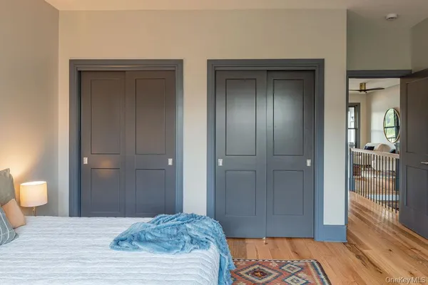 a bedroom with a bed and bathroom