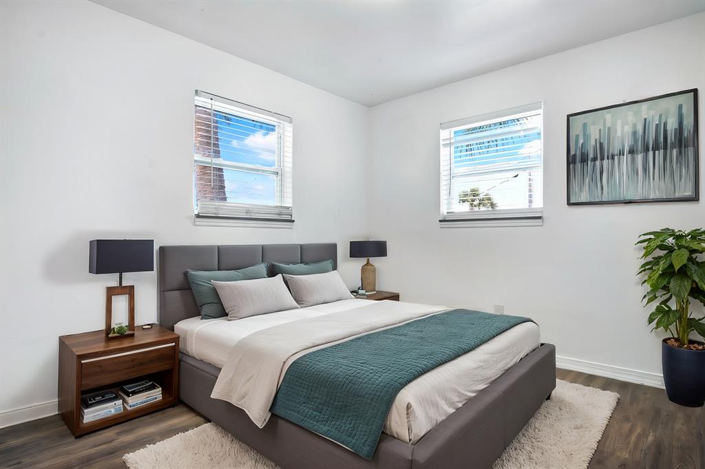 101 Northeast 35th Street, Unit A Pompano Beach, FL 33064 - Photo 13 of 23 a bedroom with bed and window