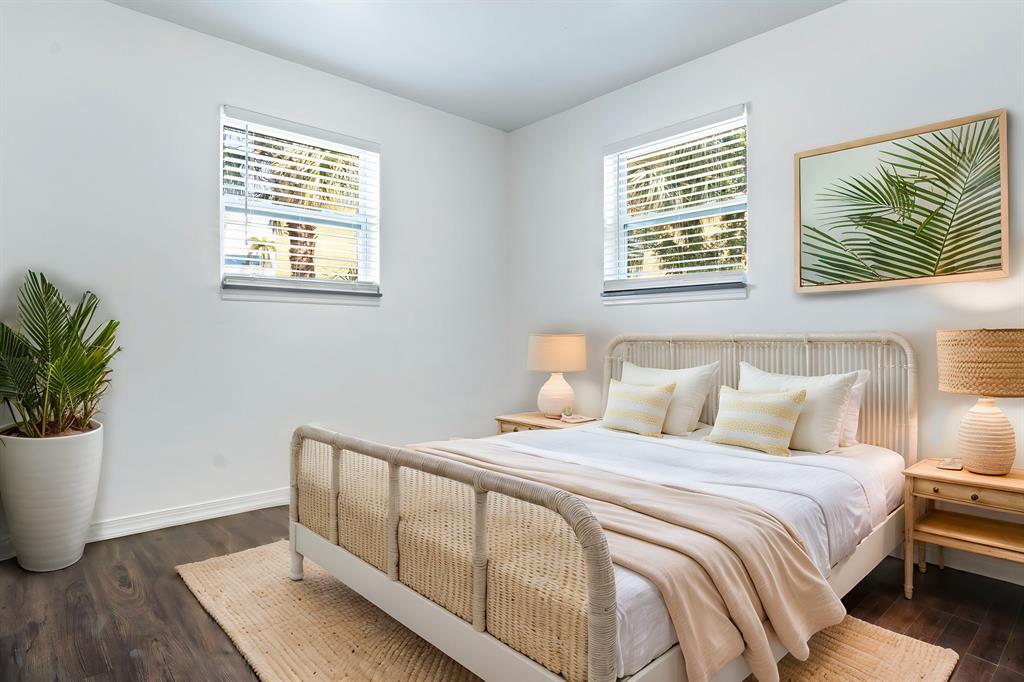 101 Northeast 35th Street, Unit A Pompano Beach, FL 33064 - Photo 18 of 23 a bedroom with a bed and a window