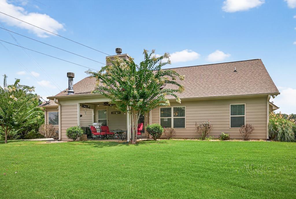 445 Katherine Drive Jefferson, GA 30549 - Photo 13 of 41 a front view of house with an outdoor seating