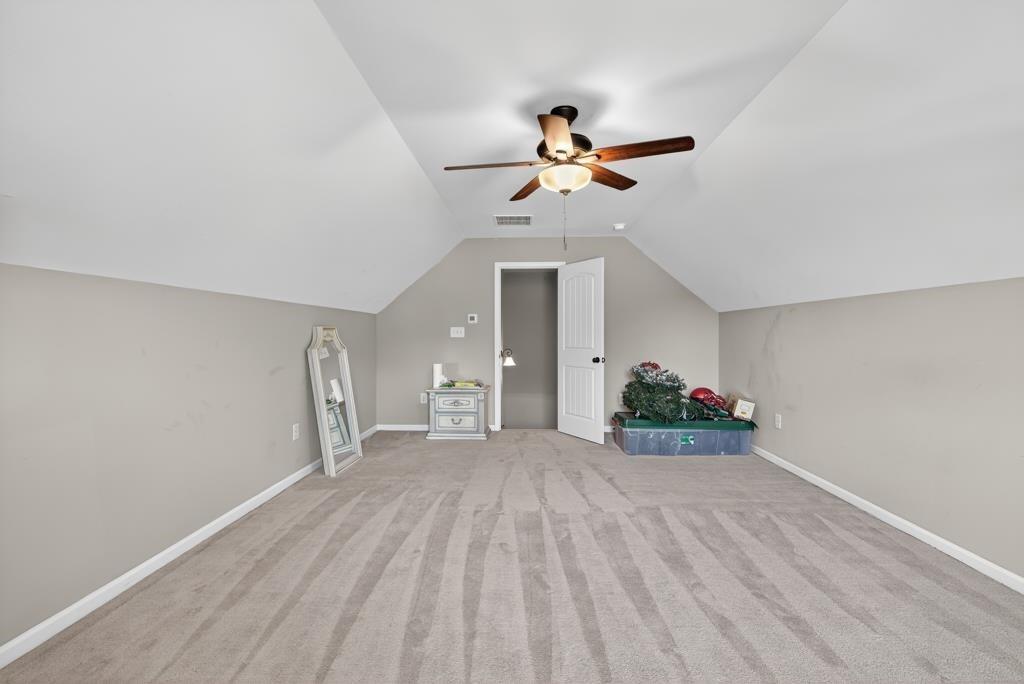 445 Katherine Drive Jefferson, GA 30549 - Photo 17 of 41 a view of a livingroom with a ceiling fan and window