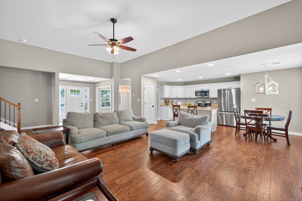 445 Katherine Drive Jefferson, GA 30549 - Photo 40 of 41 a living room with furniture and view of kitchen