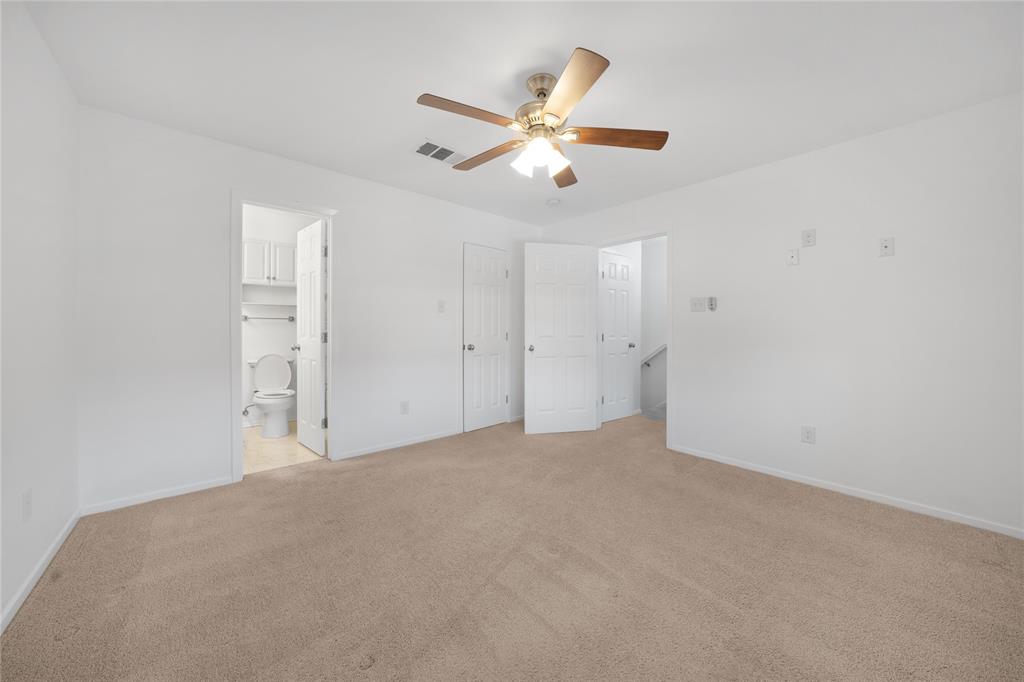 5626 Preston Oaks Road, Unit 16D Dallas, TX 75254 - Photo 12 of 29 a view of an empty room