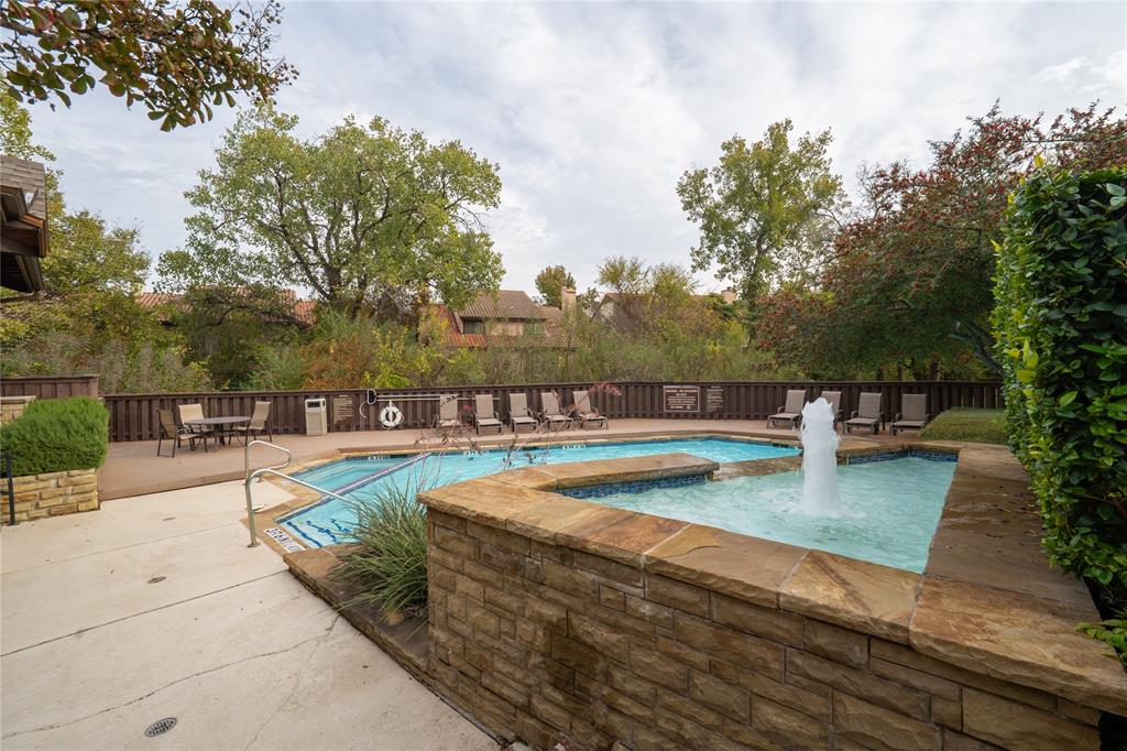 5626 Preston Oaks Road, Unit 16D Dallas, TX 75254 - Photo 26 of 29 swimming pool view with a seating space