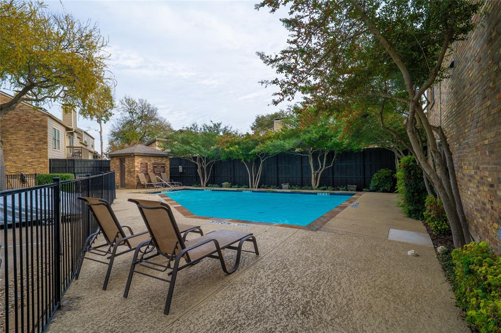 5626 Preston Oaks Road, Unit 16D Dallas, TX 75254 - Photo 28 of 29 a view of backyard with seating and green space