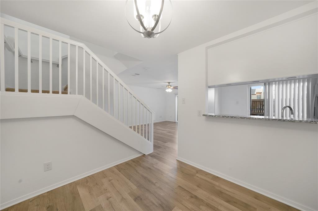 5626 Preston Oaks Road, Unit 16D Dallas, TX 75254 - Photo 6 of 29 a view of entryway with wooden floor