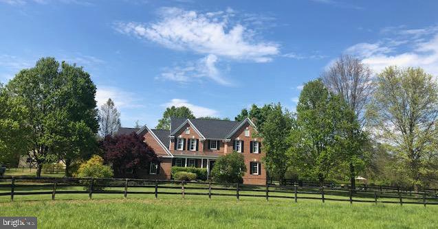 38048 Forest Mills Road Leesburg, VA 20175 - Photo 2 of 44 Watch your horses from the front porch.
