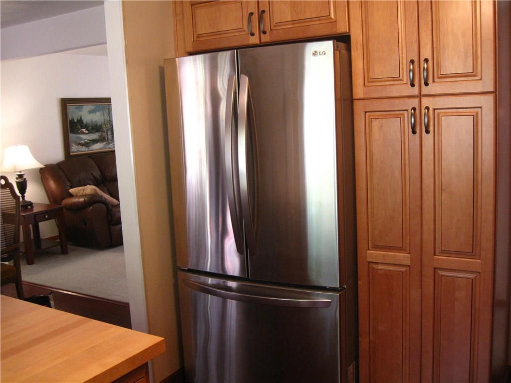 620 Filmore Road Pittsburgh, PA 15221 - Photo 14 of 25 Kitchen with stainless steel refrigerator and Pantry
