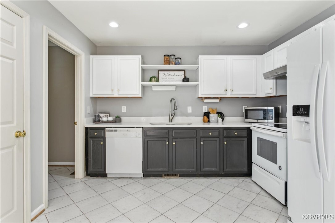 203 Oaktree Road, Unit A Williamsburg, VA 23188 - Photo 15 of 46 Kitchen with light tile patterned flooring, white